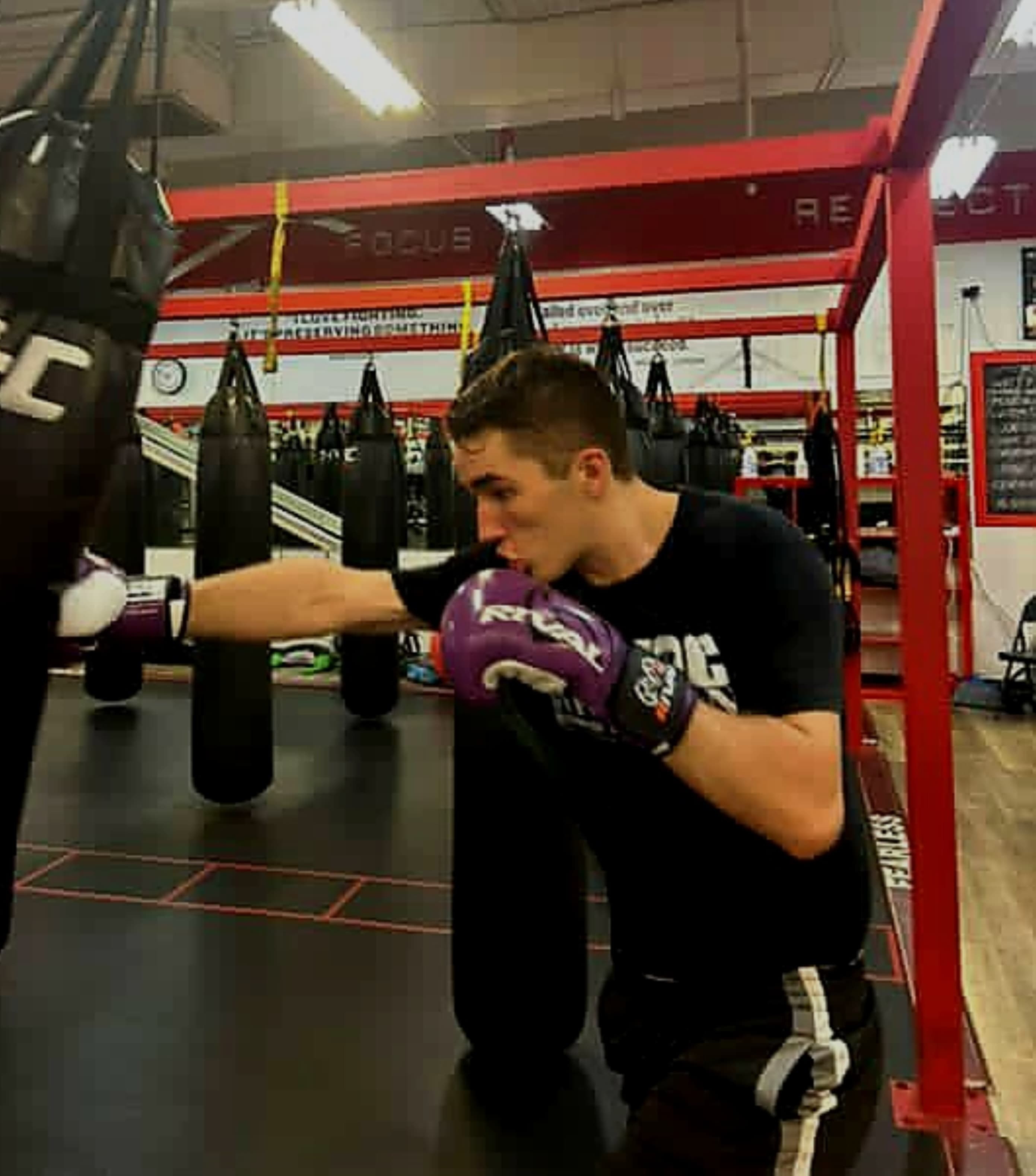Karl hitting heavy bag